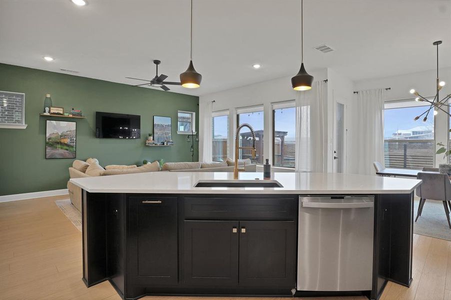 Kitchen island with sink and dishwasher