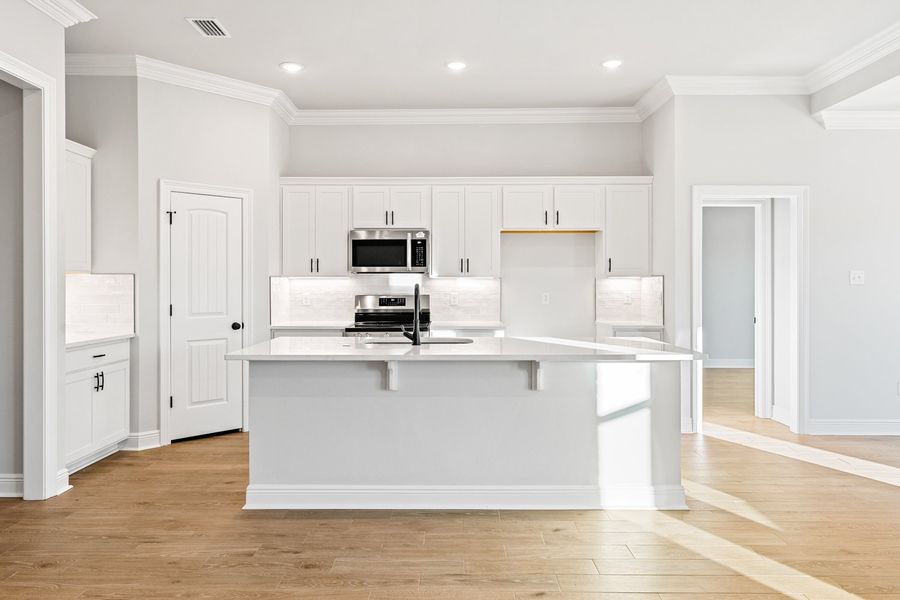 Furnished interior view inside a new home in Eagle Pointe, Pensacola (Image 5). Furnished interior view inside a new home in Eagle Pointe, Pensacola (Image 5).