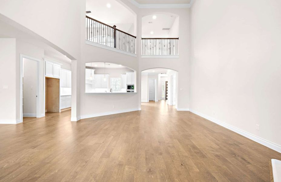 Representative unfurnished interior of a home built from the 4094 by Ravenna Homes in Artavia 70′, Conroe (Image 44).