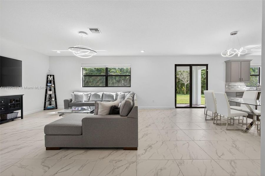 Furnished interior view inside a new home in , Royal Palm Beach (Image 11).