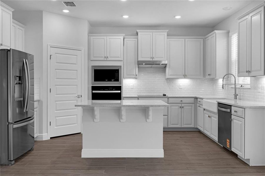 Furnished interior view inside a new home in Waterleigh, Winter Garden (Image 14).