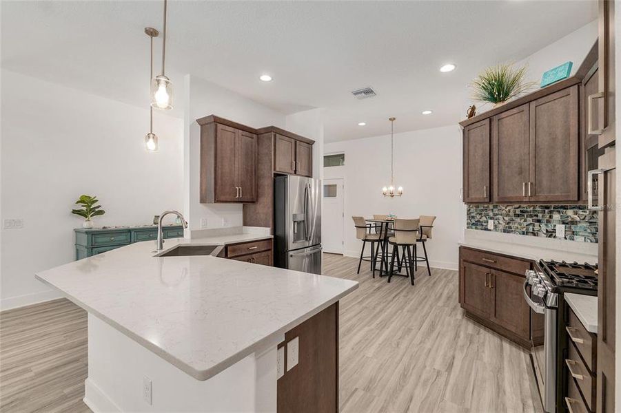 Furnished interior view inside a new home in , The Villages (Image 17).