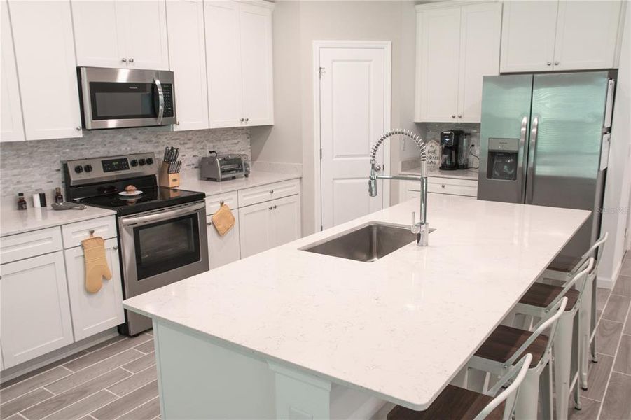 Furnished interior view inside a new home in , Gainesville (Image 15).