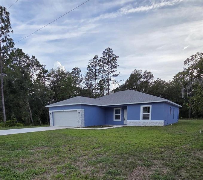 Front exterior of a new home in , Ocala, FL, highlighting curb appeal (Image 17). Front exterior of a new home in , Ocala, FL, highlighting curb appeal (Image 17).