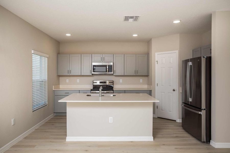 Furnished interior view inside a new home in Lawson Dunes, Haines City (Image 9). Furnished interior view inside a new home in Lawson Dunes, Haines City (Image 9).
