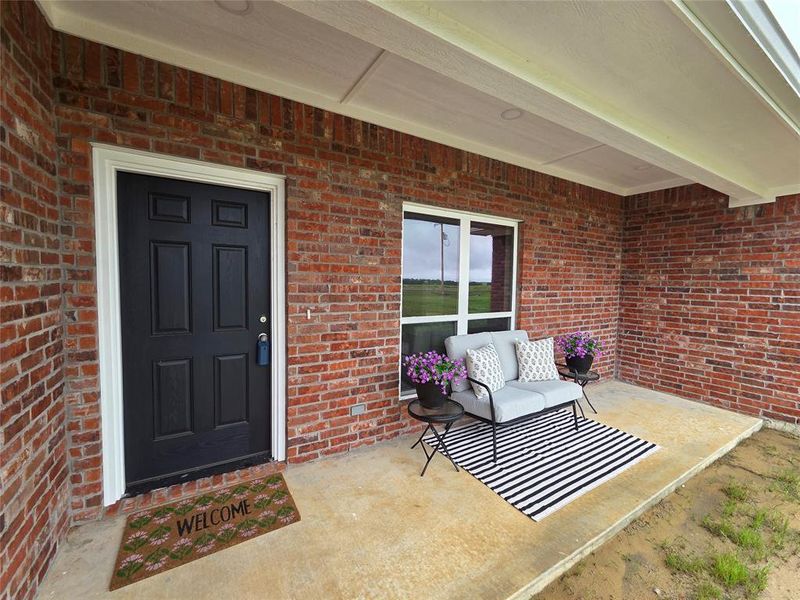 View of exterior entry featuring brick siding View of exterior entry featuring brick siding
