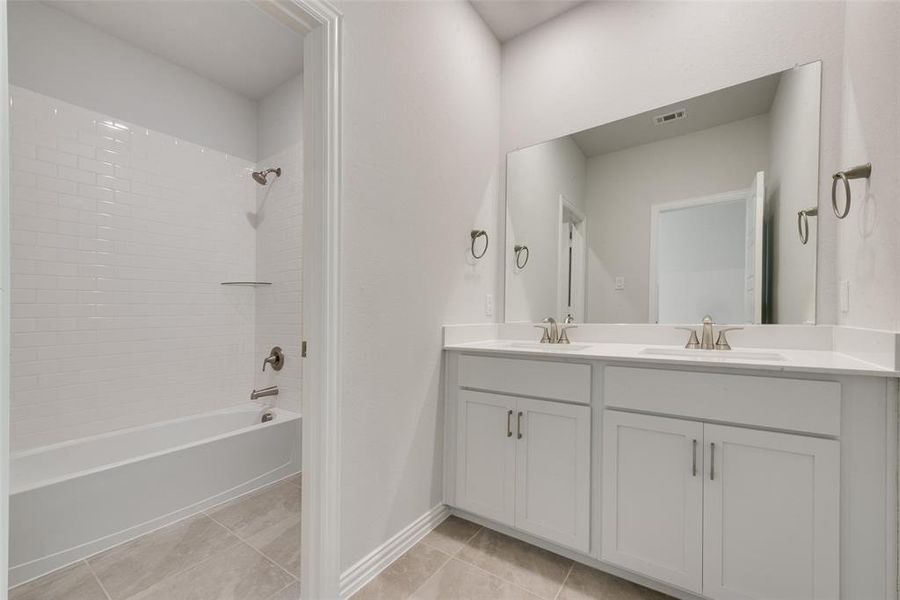 Furnished interior view inside a new home in Villages of Hurricane Creek, Anna (Image 13).