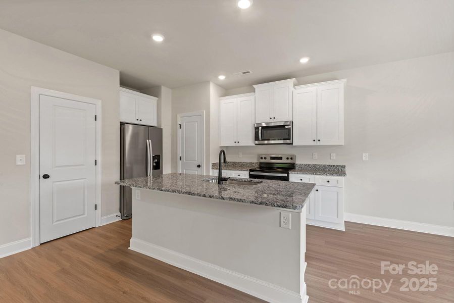 Furnished interior view inside a new home in Ascot Woods, Charlotte (Image 7).