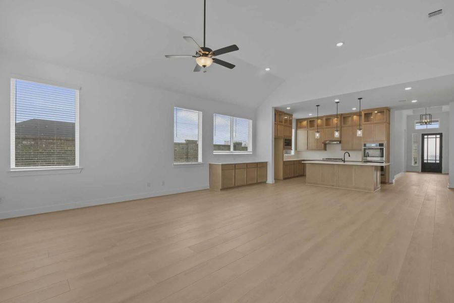 Representative unfurnished interior of a home built from the Madison by Chesmar Homes in Newhaven, Manor (Image 13).