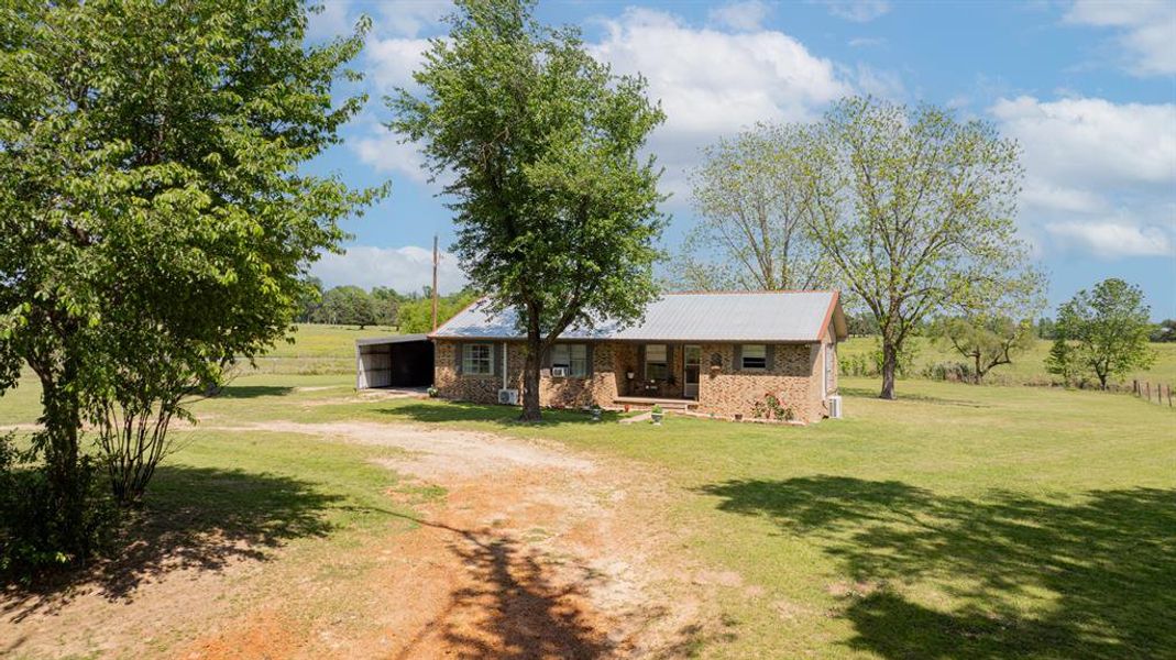 Front exterior of a new home in , Leesburg, TX, highlighting curb appeal (Image 25).