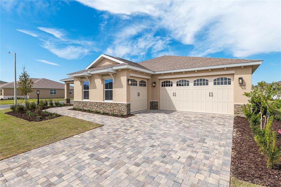 Front exterior of a new home in , Ocala, FL, highlighting curb appeal (Image 25).