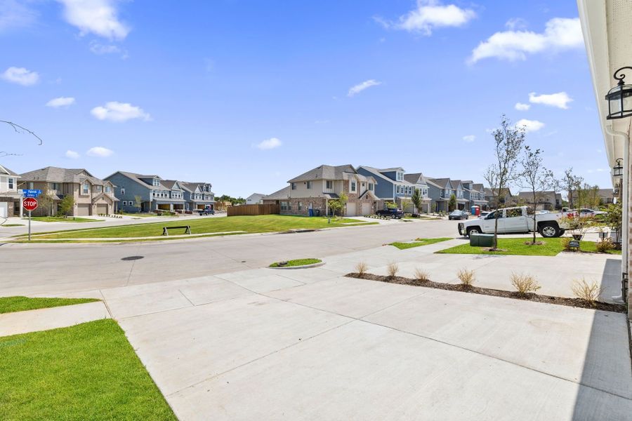 Front exterior of a new home in Lake Park Villas, Wylie, TX, highlighting curb appeal (Image 50).