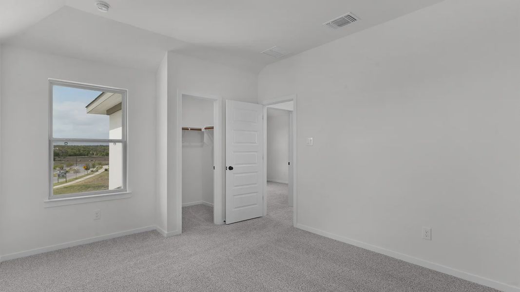 Spacious, unfurnished interior of a new home in Lariat, Liberty Hill (Image 19). Spacious, unfurnished interior of a new home in Lariat, Liberty Hill (Image 19).