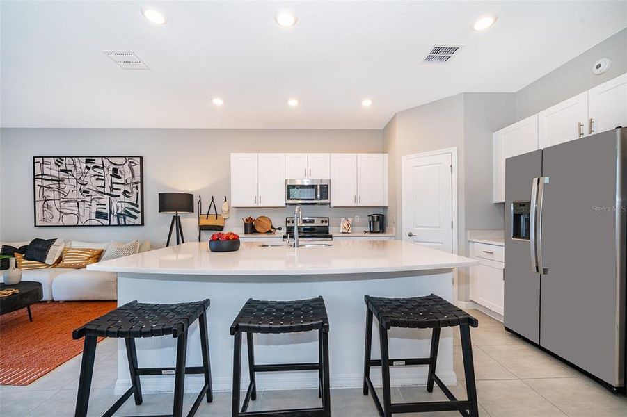 Furnished interior view inside a new home in Horse Creek at Crosswinds, Davenport (Image 15).