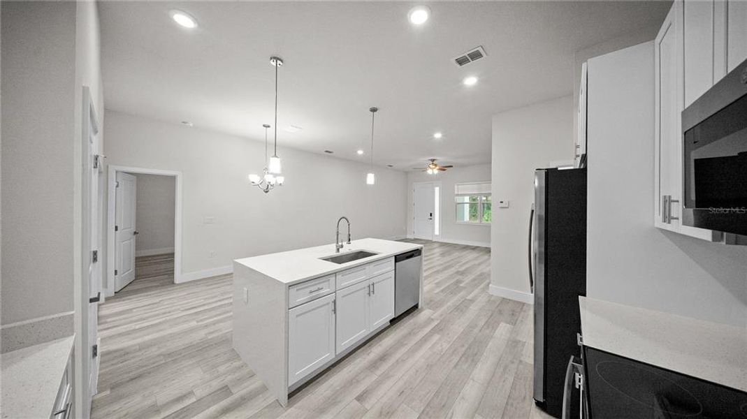 Furnished interior view inside a new home in , North Port (Image 11).