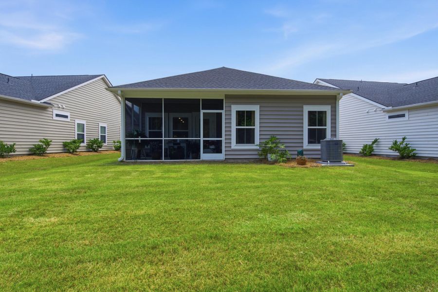 Exterior details and patio area of a home in Horizons at Summers Corner | 55+, Summerville (Image 30).