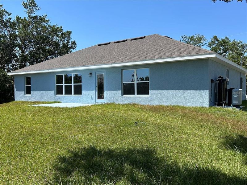 Exterior details and patio area of a home in North Port, North Port (Image 3).