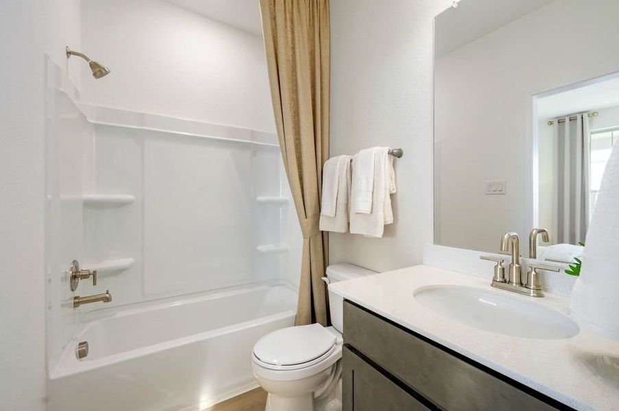 Representative furnished interior of a home built from the Emory by Pulte Homes in Nopal Valley, San Antonio (Image 14).