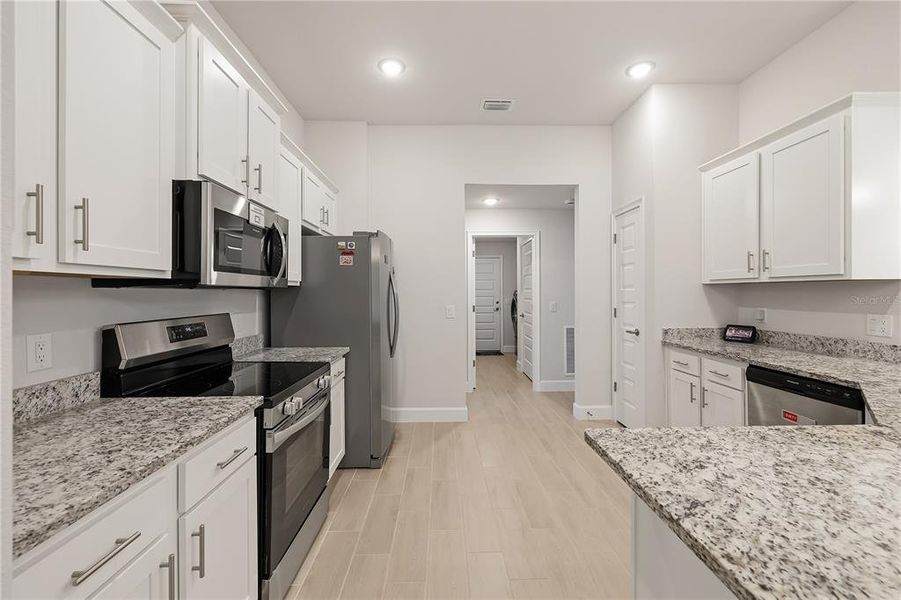 Furnished interior view inside a new home in , Port Charlotte (Image 19).