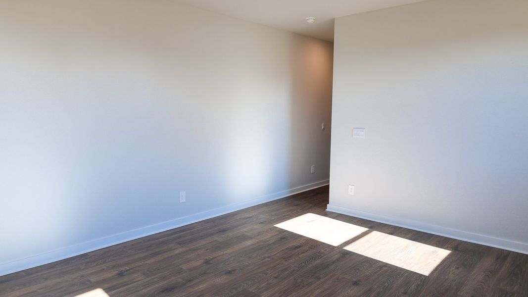 Representative unfurnished interior of a home built from the STONEBROOK II by D.R. Horton in Harvest Point, Spring Hill (Image 45).