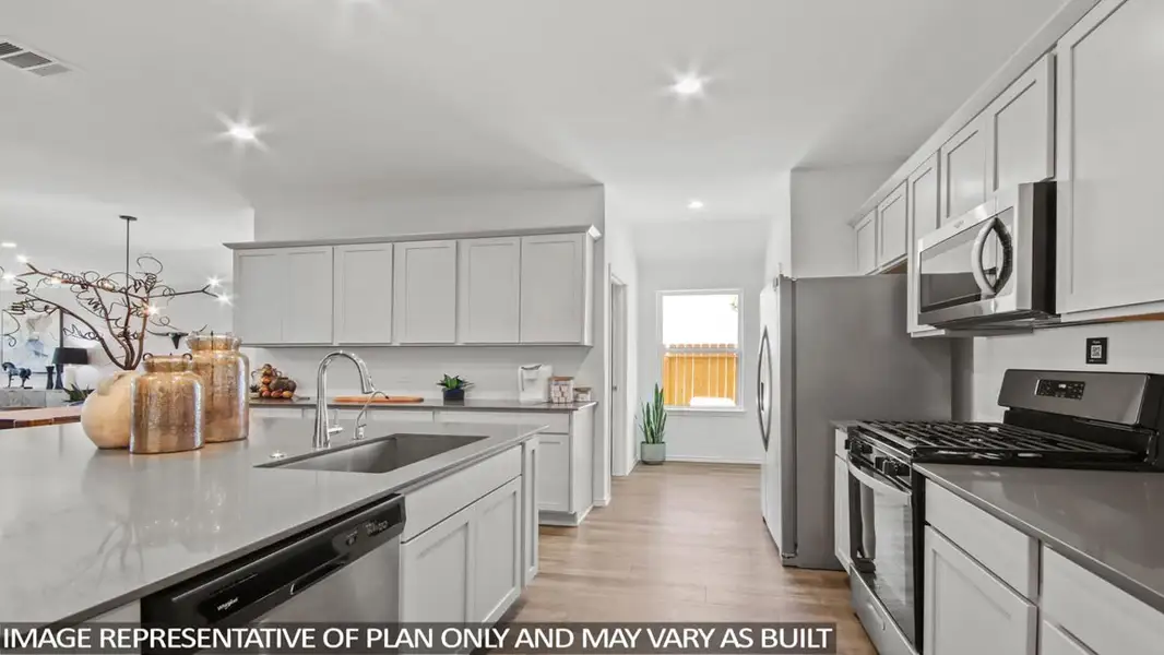 Furnished interior view inside a new home in East Williams Cove, Conroe (Image 5).