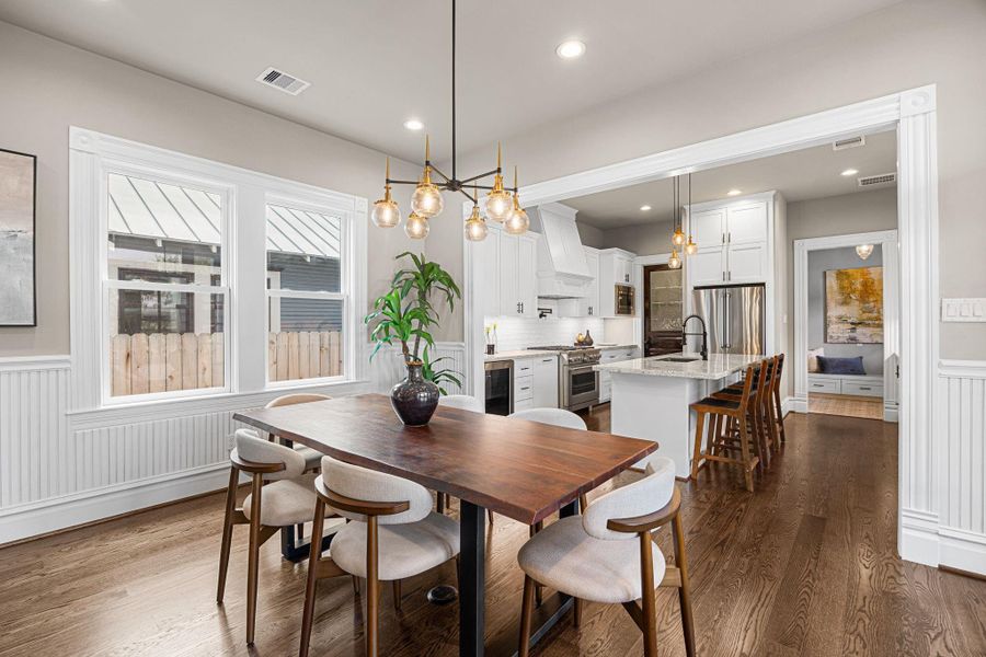 Adjacent to the kitchen is your dining area, which can comfortably accommodate seating for 6-10. Adjacent to the kitchen is your dining area, which can comfortably accommodate seating for 6-10.