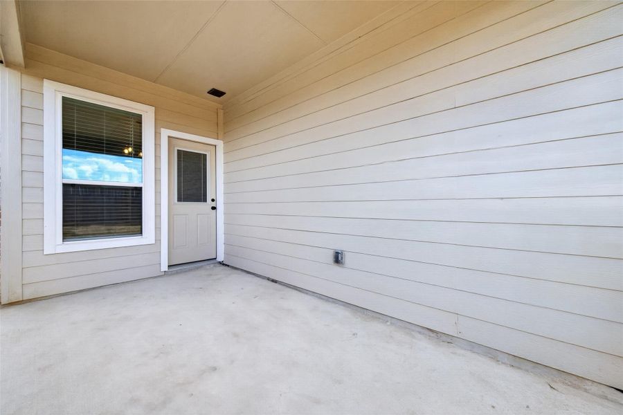 Exterior details and patio area of a home in La Segarra, Brookshire (Image 22).