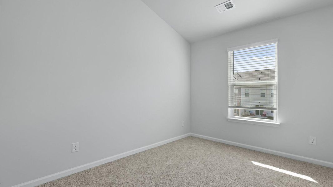 Spacious, unfurnished interior of a new home in Pine Hills Townhomes at Cane Bay, Summerville (Image 22). Spacious, unfurnished interior of a new home in Pine Hills Townhomes at Cane Bay, Summerville (Image 22).