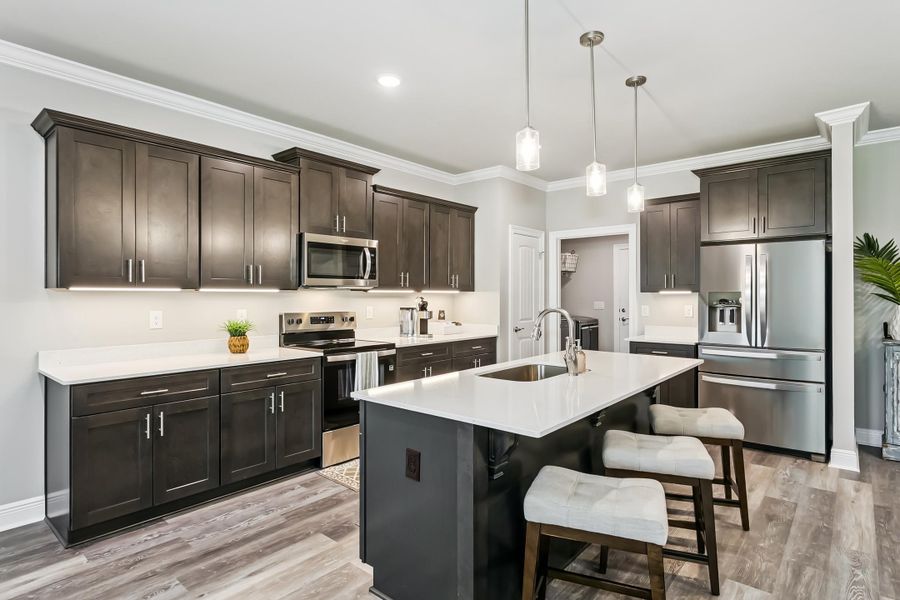 Furnished interior view inside a new home in Buckeyes Landing, Navarre (Image 8).