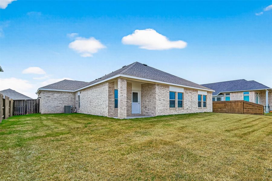 Exterior details and patio area of a home in Arabella on the Prairie, Richmond (Image 30).
