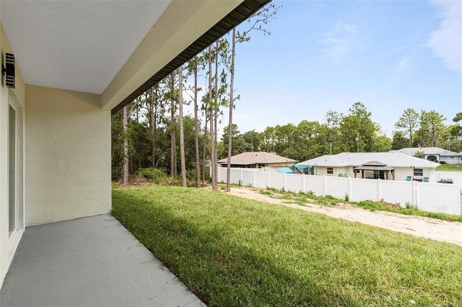 Exterior details and patio area of a home in , Citrus Springs (Image 3).