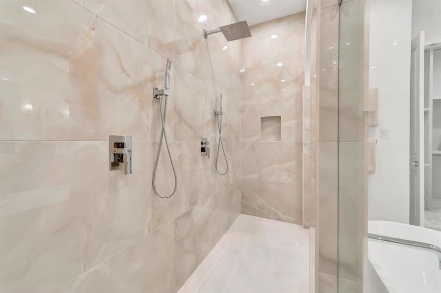 Full bath featuring a stall shower Full bath featuring a stall shower