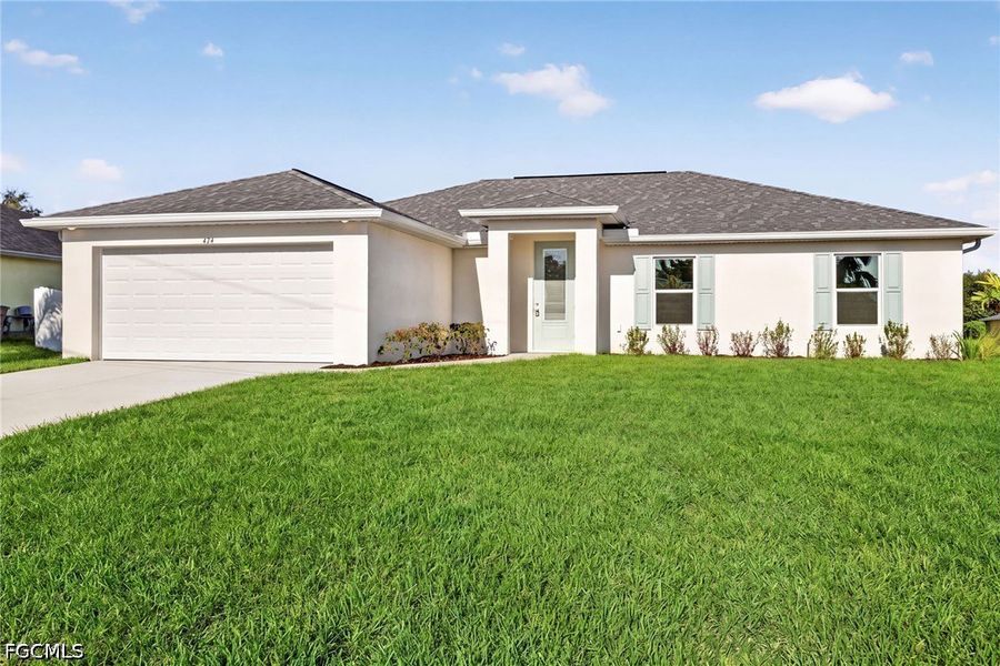 Front exterior of a new home in Cape Coral, Cape Coral, FL, highlighting curb appeal (Image 2). Front exterior of a new home in Cape Coral, Cape Coral, FL, highlighting curb appeal (Image 2).