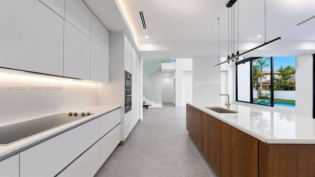 Furnished interior view inside a new home in , Miami Lakes (Image 17).