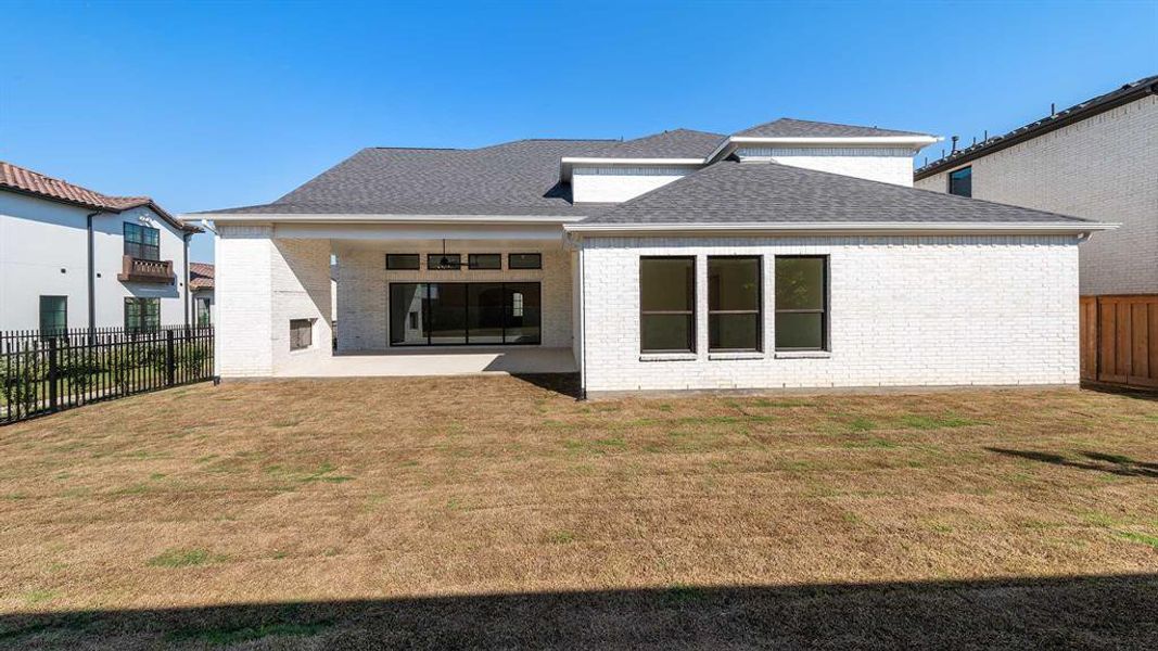 Exterior details and patio area of a home in Fields 60', Frisco (Image 4).