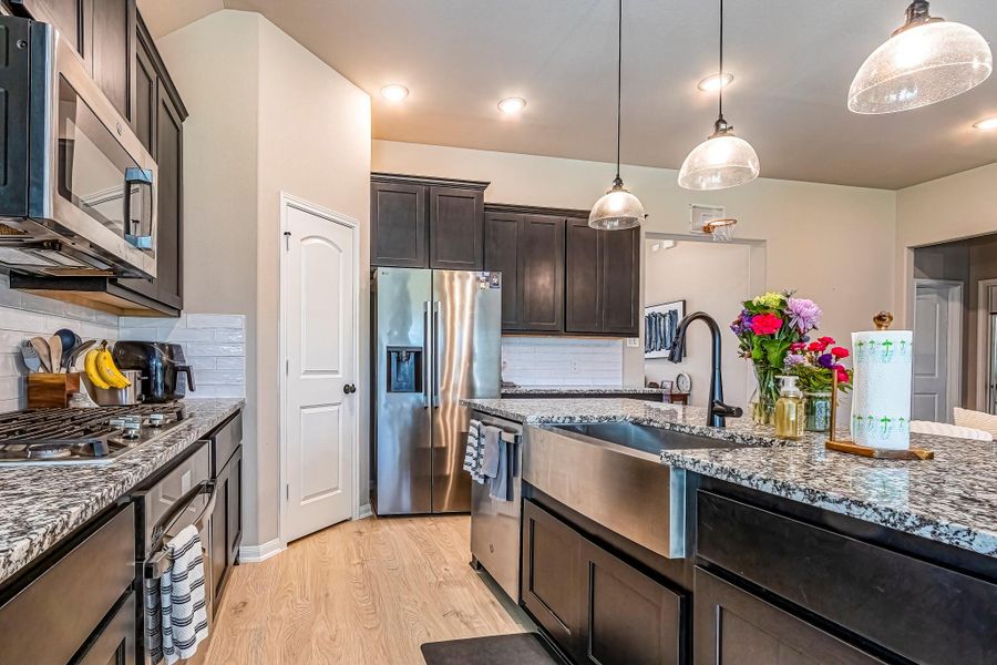Furnished interior view inside a new home in , Conroe (Image 37).