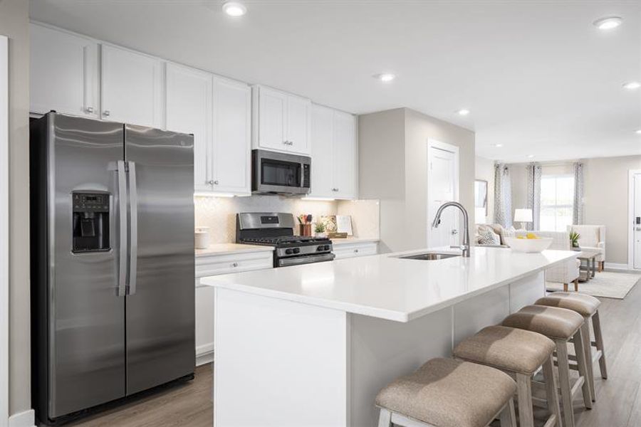 Representative furnished interior of a home built from the Nassau Cove Quick Move-In by Ryan Homes in Cobblestone at East Argent, Hardeeville (Image 5).
