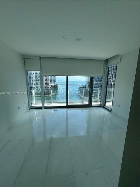 Spacious, unfurnished interior of a new home in Aston Martin Residences, Miami (Image 57).