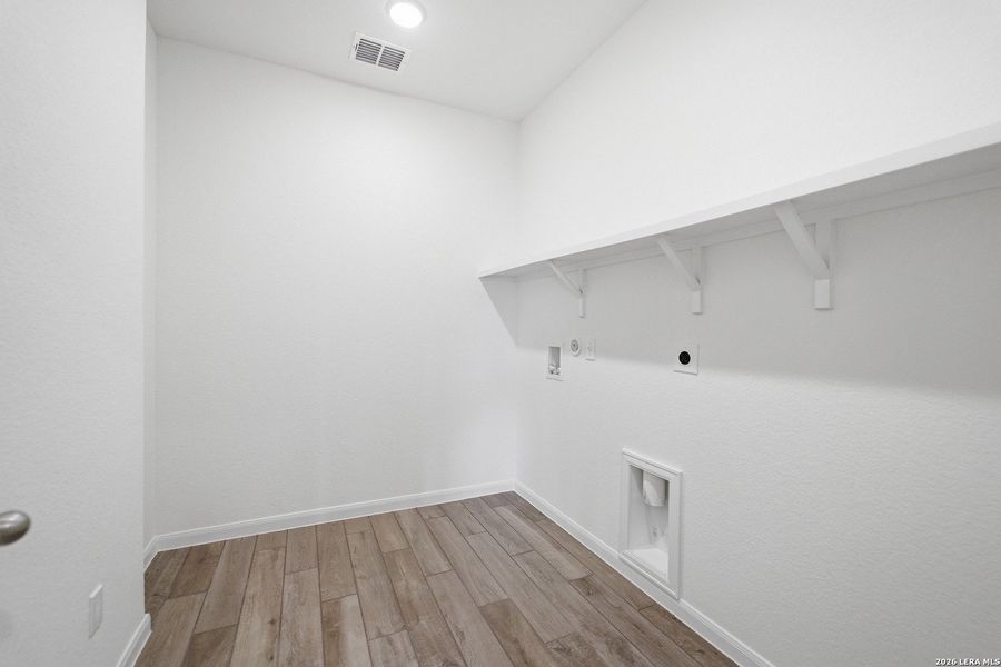 Spacious, unfurnished interior of a new home in Megan's Landing, Castroville (Image 24).