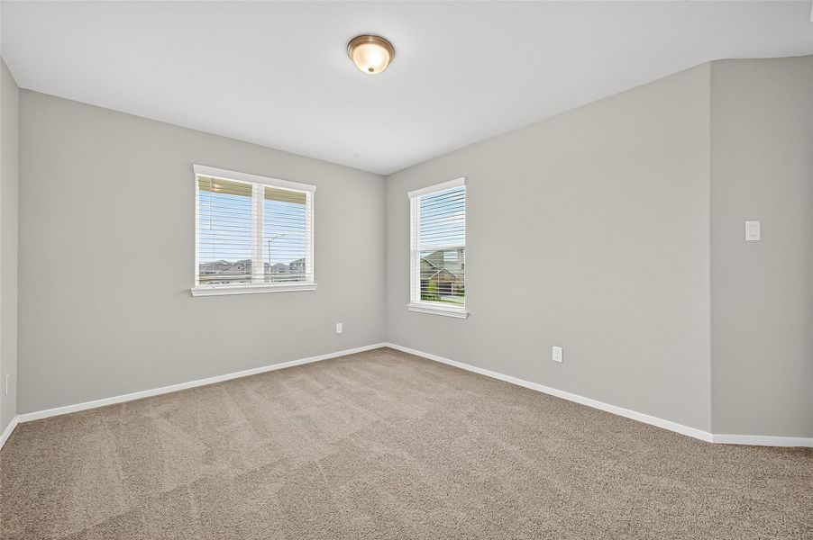 Spacious, unfurnished interior of a new home in Sunterra, Katy (Image 31).