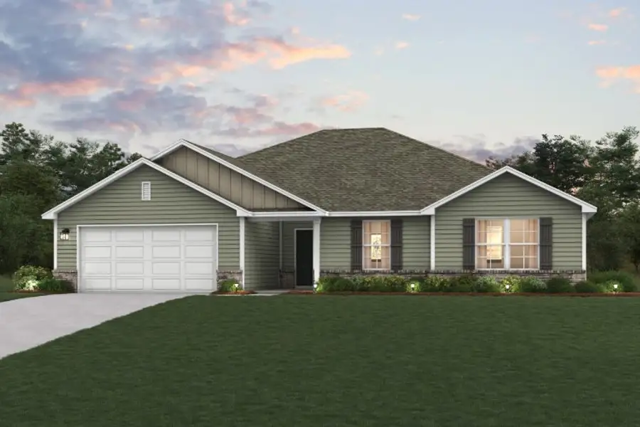 A house with a lawn in front of it. A house with a lawn in front of it.