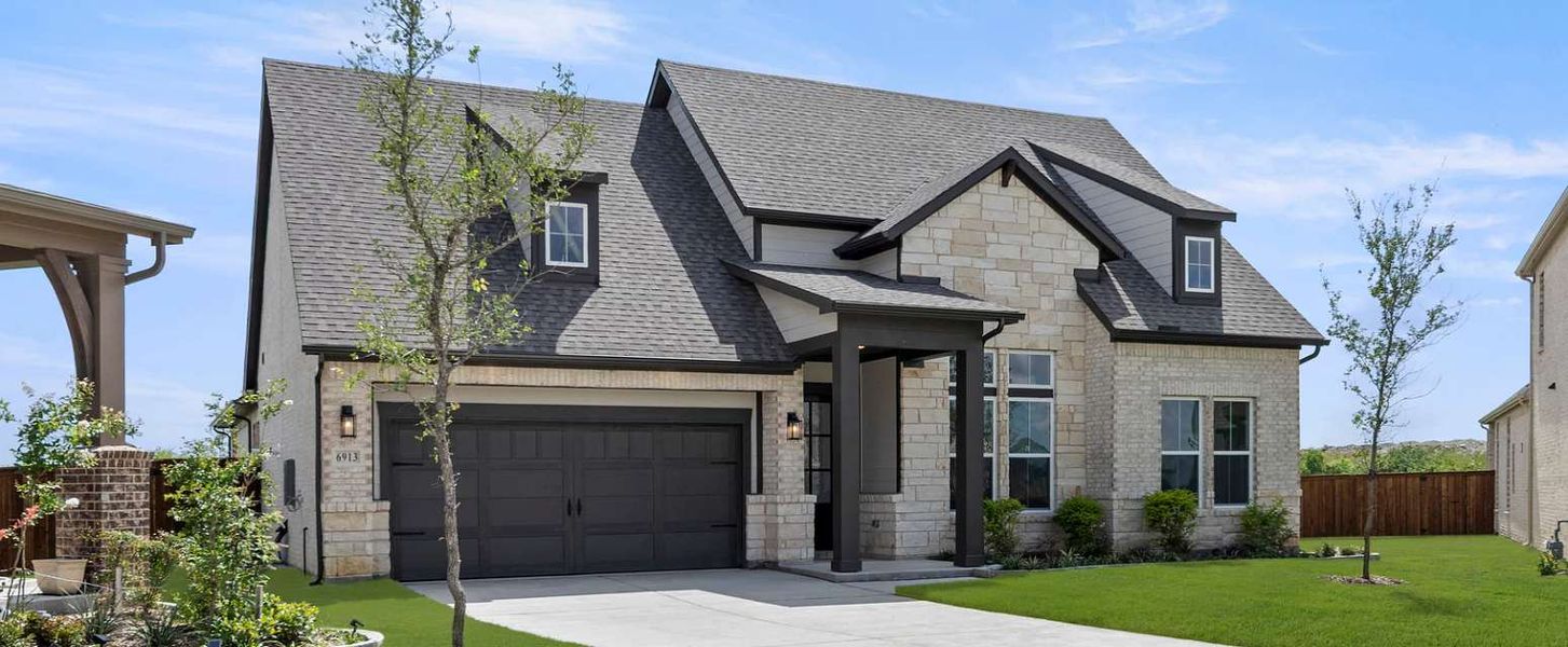Representative exterior photo of a completed home built from the Ellington by Ashton Woods in Furst Ranch, Flower Mound, TX (Image 22). Representative exterior photo of a completed home built from the Ellington by Ashton Woods in Furst Ranch, Flower Mound, TX (Image 22).