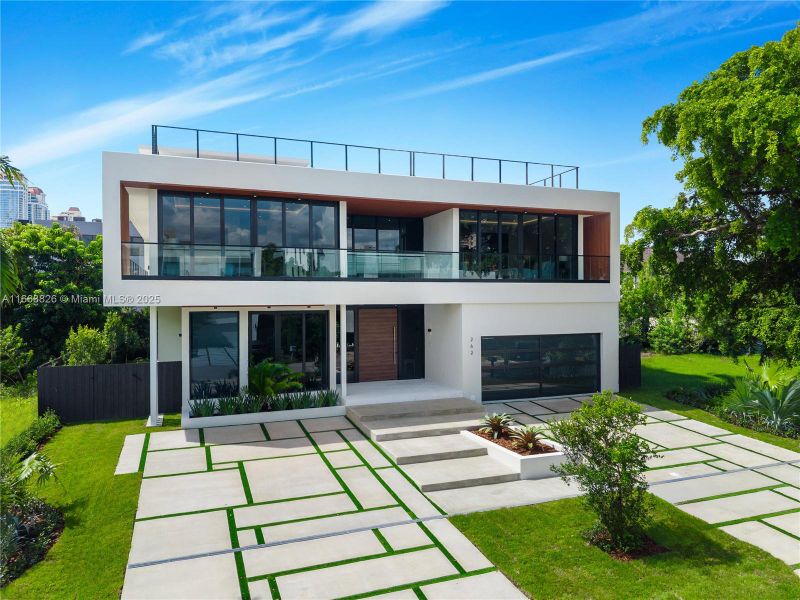 Front exterior of a new home in , Sunny Isles Beach, FL, highlighting curb appeal (Image 22).