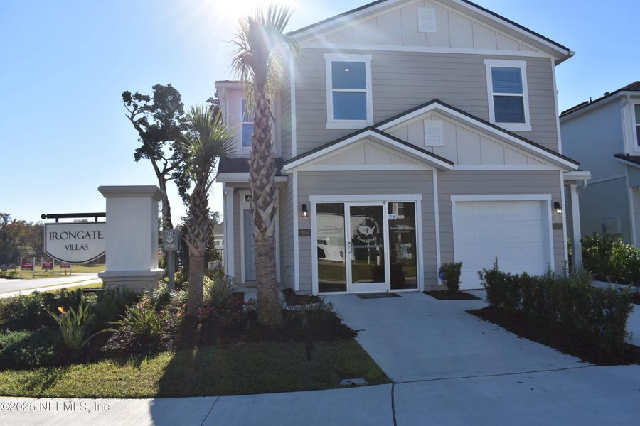 Front exterior of a new home in Irongate Villas, Jacksonville, FL, highlighting curb appeal (Image 2).
