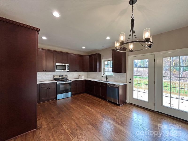 Furnished interior view inside a new home in , Newton (Image 8).