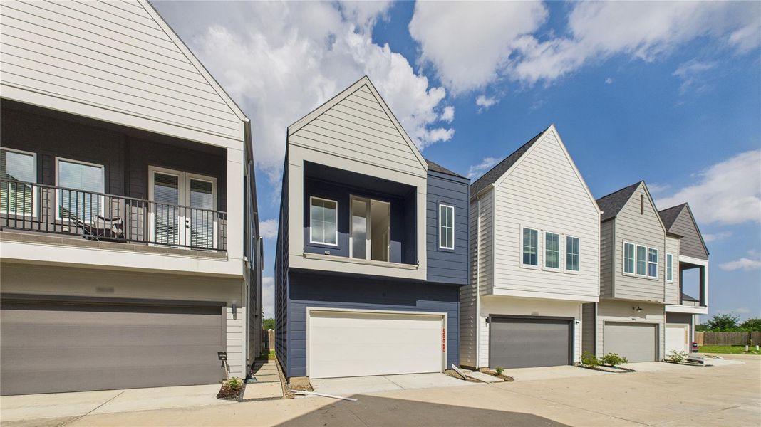 This thoughtfully designed two-story residence offers the perfect blend of modern living and practical layout. The second floor features an open-concept living, dining, and kitchen area, creating a seamless flow ideal for entertaining. Expansive windows and direct access to a private balcony from the living room invite natural light and fresh air, enhancing the indoor-outdoor experience. This thoughtfully designed two-story residence offers the perfect blend of modern living and practical layout. The second floor features an open-concept living, dining, and kitchen area, creating a seamless flow ideal for entertaining. Expansive windows and direct access to a private balcony from the living room invite natural light and fresh air, enhancing the indoor-outdoor experience.