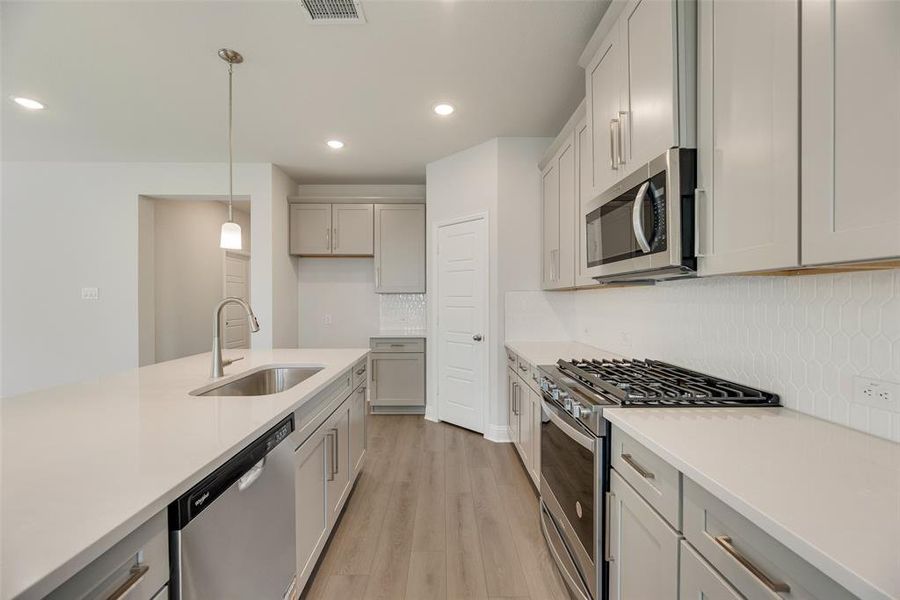 Furnished interior view inside a new home in Arbors at Legacy Hills, Celina (Image 8). Furnished interior view inside a new home in Arbors at Legacy Hills, Celina (Image 8).