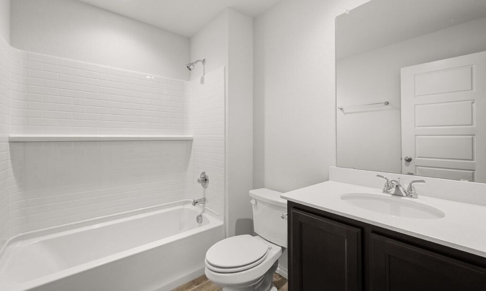 Representative exterior photo of a completed home built from the Walden II by Impression Homes in Stone Eagle, Azle, TX (Image 22).