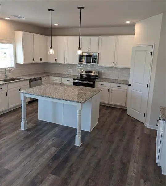 Furnished interior view inside a new home in , Auburn (Image 3).