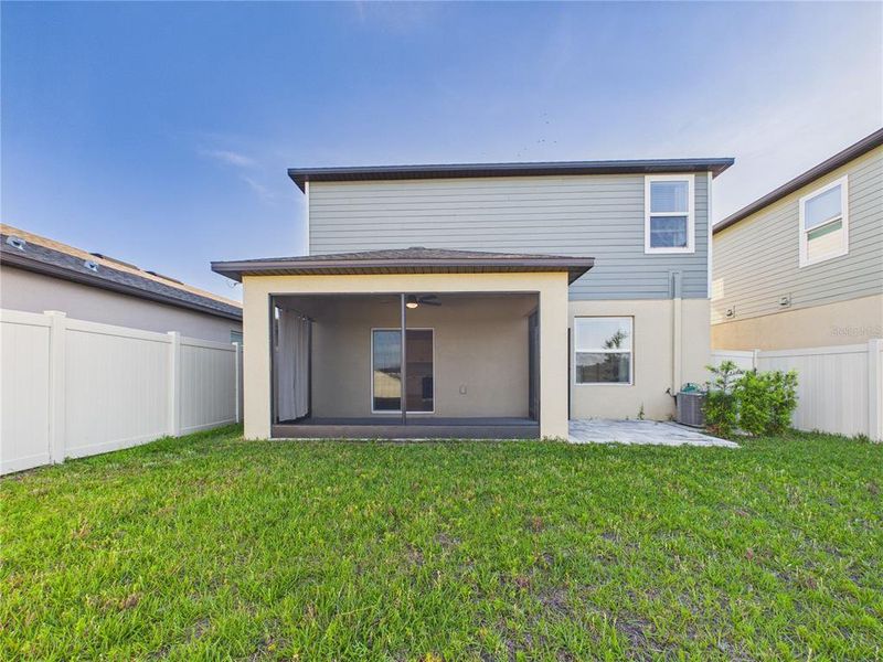 Exterior details and patio area of a home in Two Rivers, Zephyrhills (Image 31).